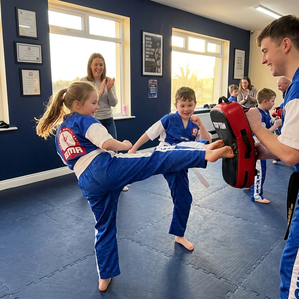 Young Bushido student kicking a red pad held by a smiling coach while parents cheer